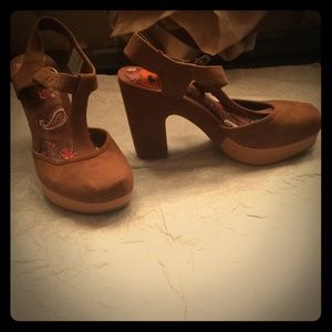 Tan clog-style heels